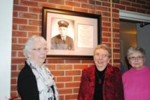  FF Edward Hoffman’s nieces Nancy Aders, Carolyn Corn and Judith Schriefer gather under the photo of their uncle.  