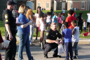 Attendees & Police at the May 23, 2019 Summer Block Party