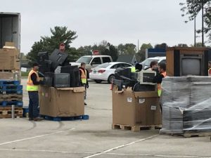 Containers full of old televisions to be recycled