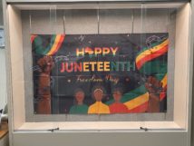 Picture of the Juneteenth banner in the City Building Atrium 