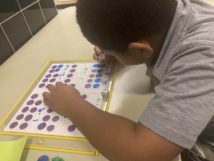 A student practices math facts