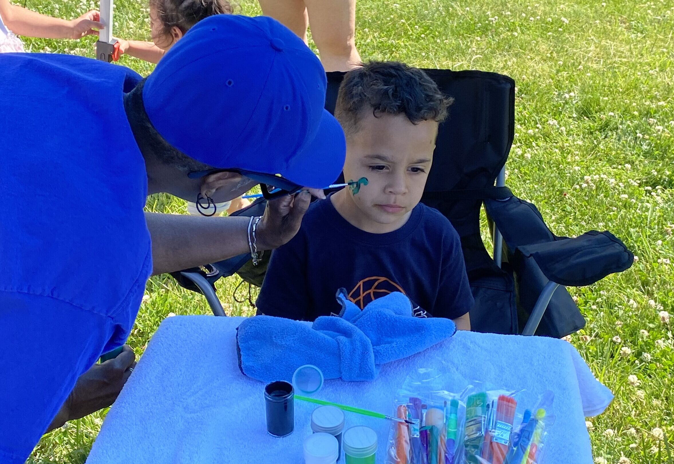 Face painting at Hedge Pop! Park
