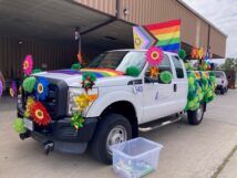 White pickup truck decorated for Pride Fest Parade