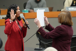 Joan Walls being sworn in by Mayor Deborah Frank Feinen