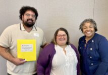 Equity & Engagement Community Relations Manager & Compliance Officer Janel Gomez and Community Relations Specialist Julio Velasco posing for a picture at the City of Bloomington’s Inclusion & Access Compliance Symposium