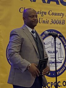 Police Chief Timothy Tyler being honored for his retirement after 35 years of military service.