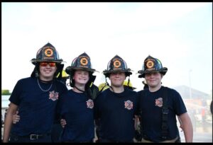 Four Explorers demonstrating teamwork.